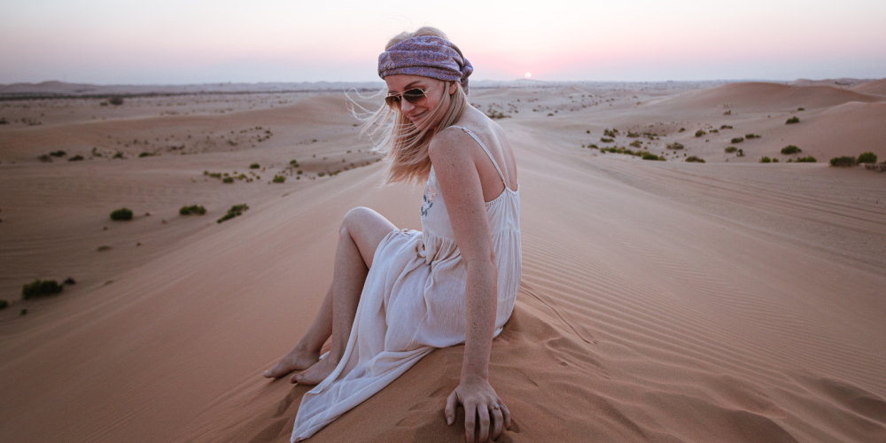 Girl enjoying Desert trip desert safari dress code